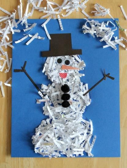 Shredded Bond Paper form into a snow man with a stick hands and a brown hat