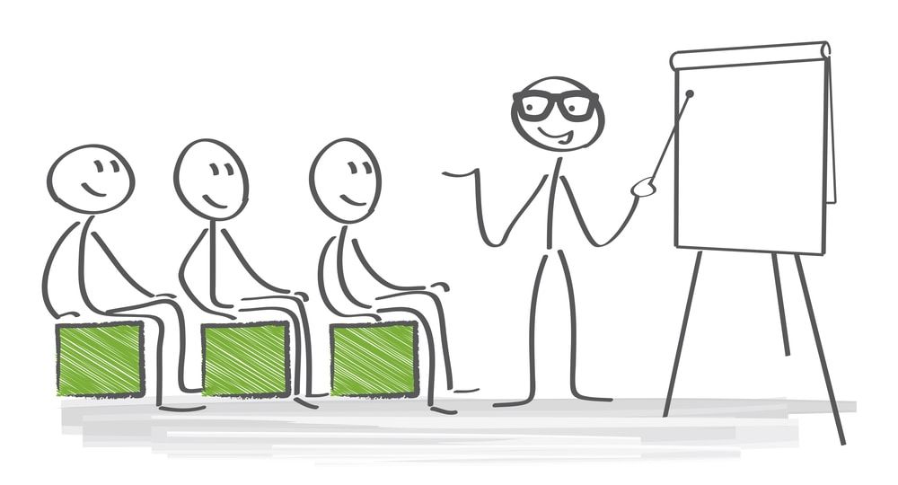 One human stick teacher drawing teaching three human stick drawing with green drawn chairs and board
