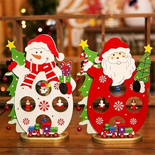 Santa and Snowman side by side with several Christmas related decorations standing on a wooden platform