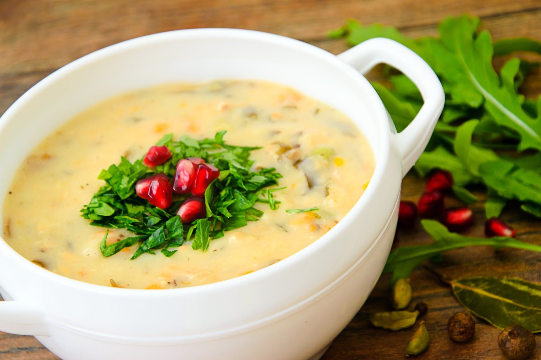 Healthy and Diet Food: Soup of Chowder with Pomegranate. Studio Photo