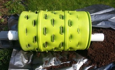 Painted barrel with installed compost tube.