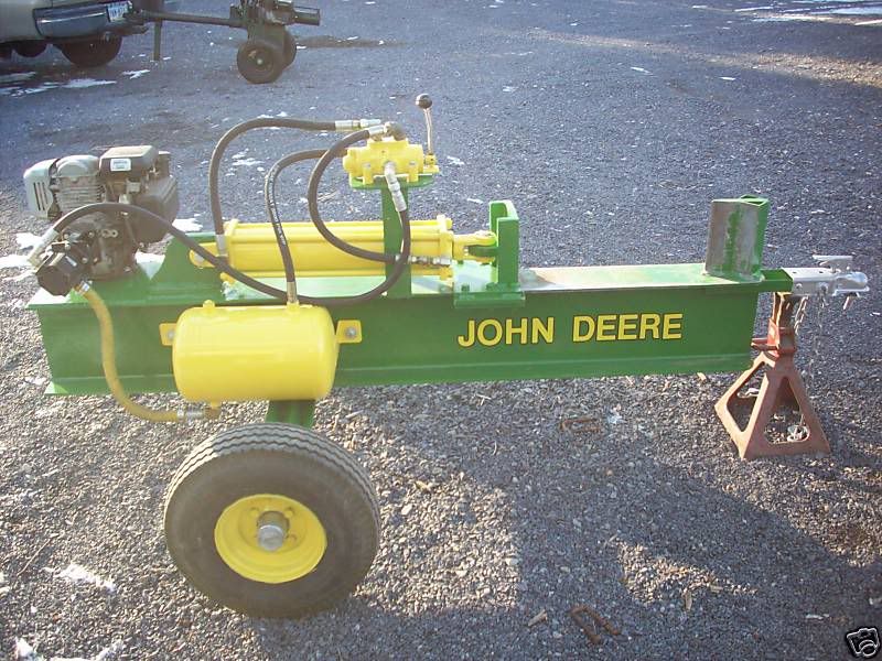 Hydraulic tank log splitter in yellow and green color combination