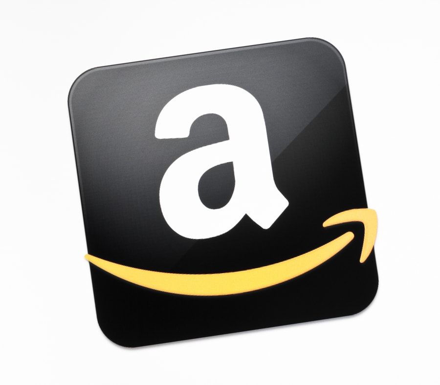 Amazon.com logo sign button in a white background