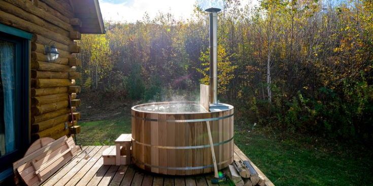 wooden hot tub on the backyard