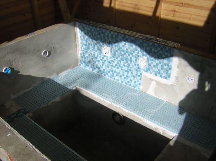 hot tub made of cement and tiles