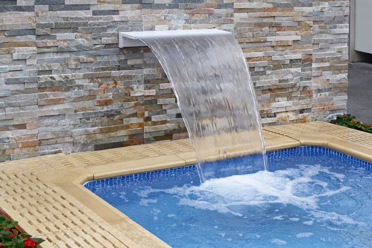Small modern spa pool with water flow