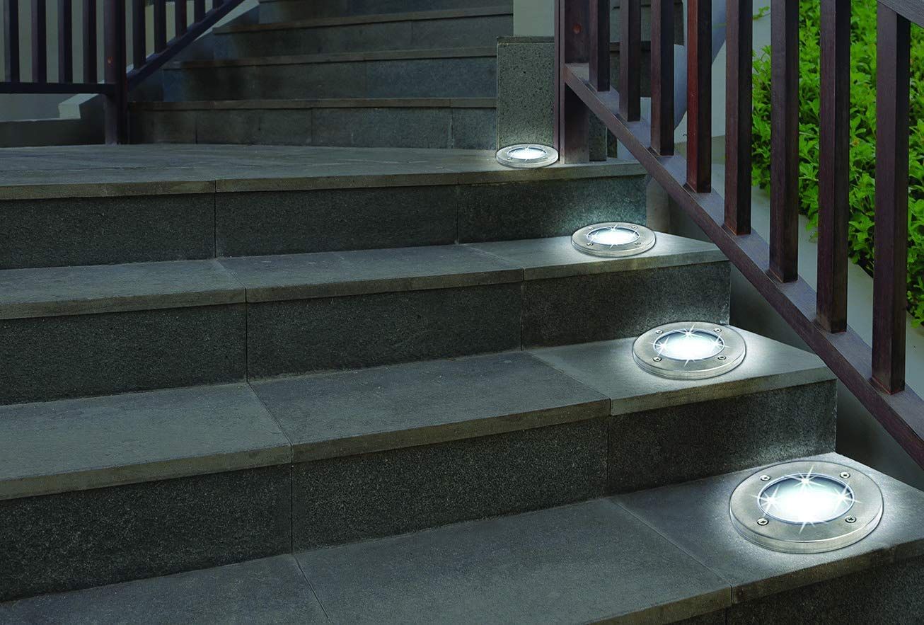 Bell + Howell Solar Disk Light put on the side of the steps to light stairs.
