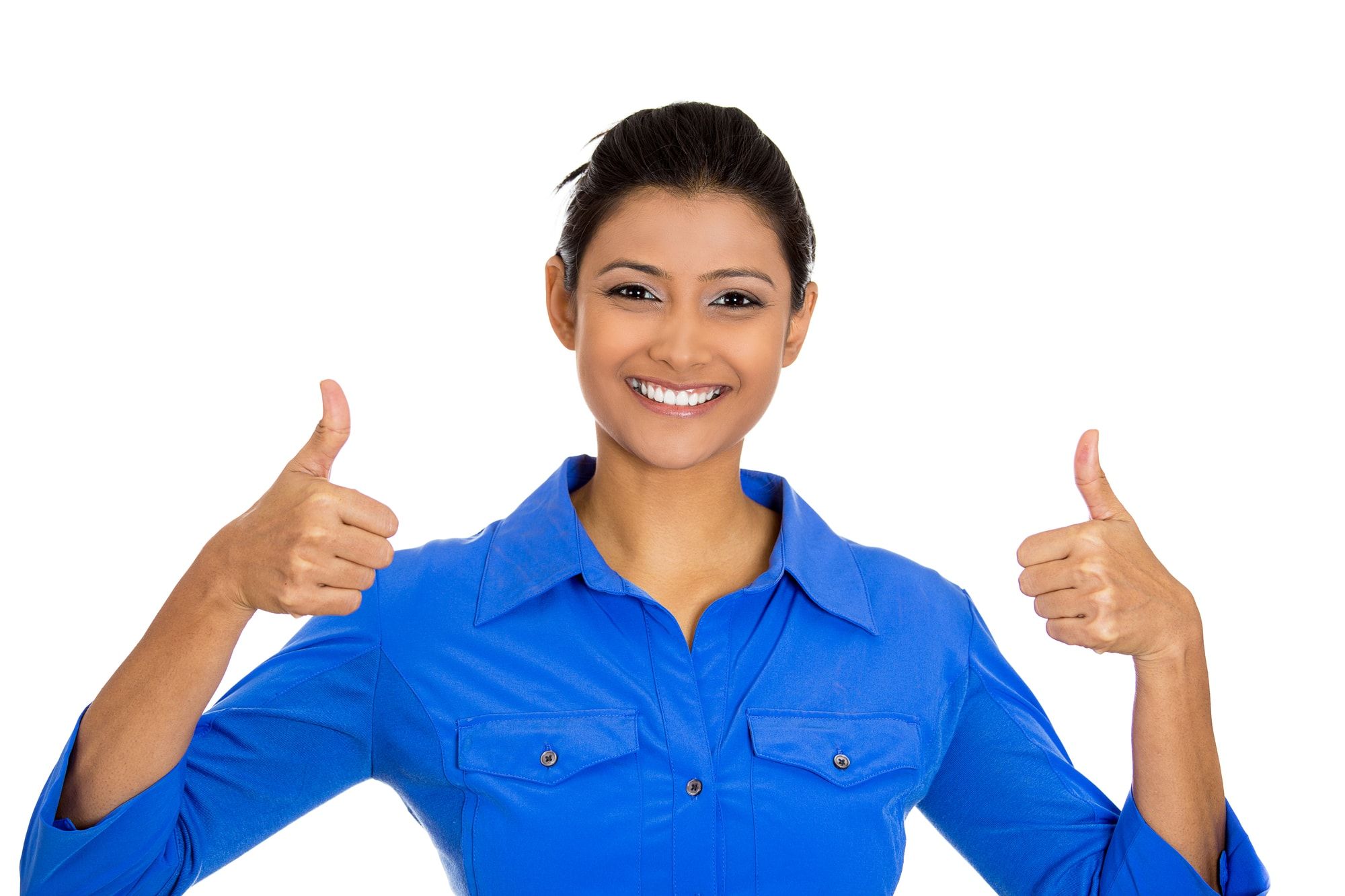 Closeup portrait of young pretty woman with two thumbs up sign gesture pointing at you, isolated on white background. Positive emotion facial expression feelings, signs and symbols, body language
