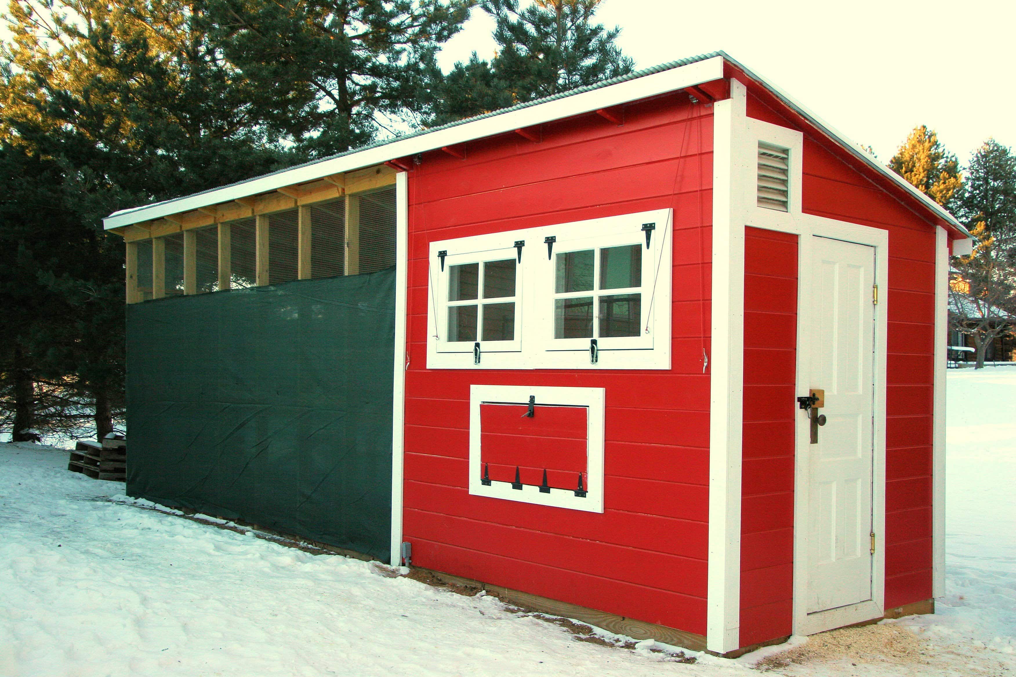 Chicken Coop With Run at the backyard in winter season