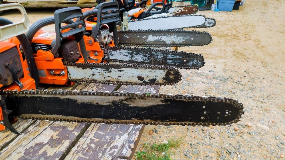 A well used chainsaw professional petrol chain saw
