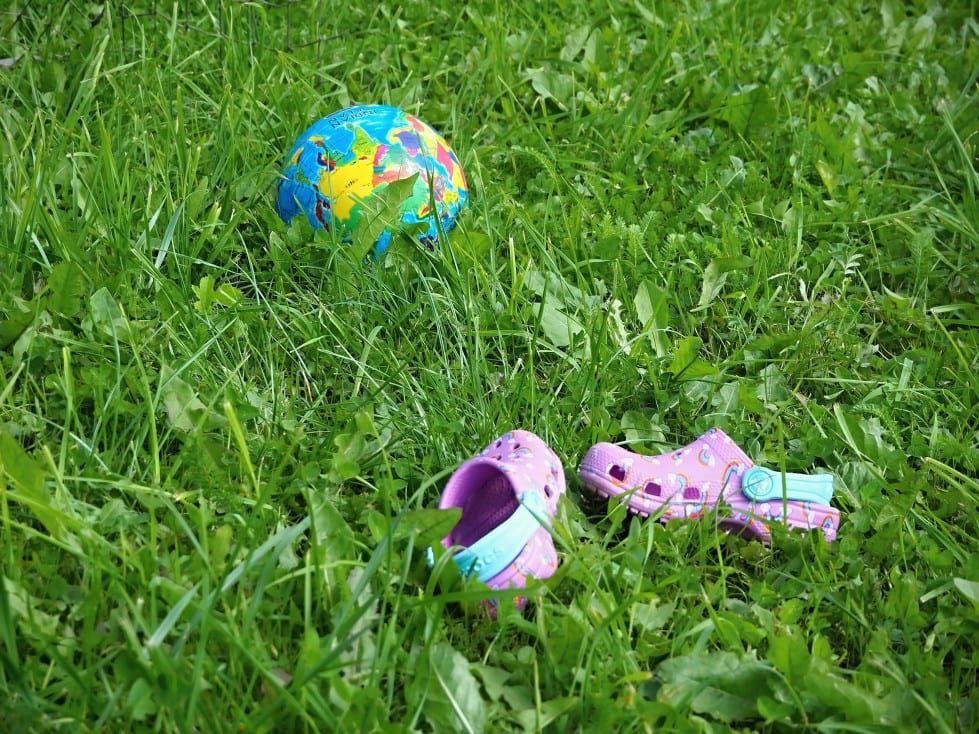 childrens outdoor game steal the bacon ball or shoe in grass