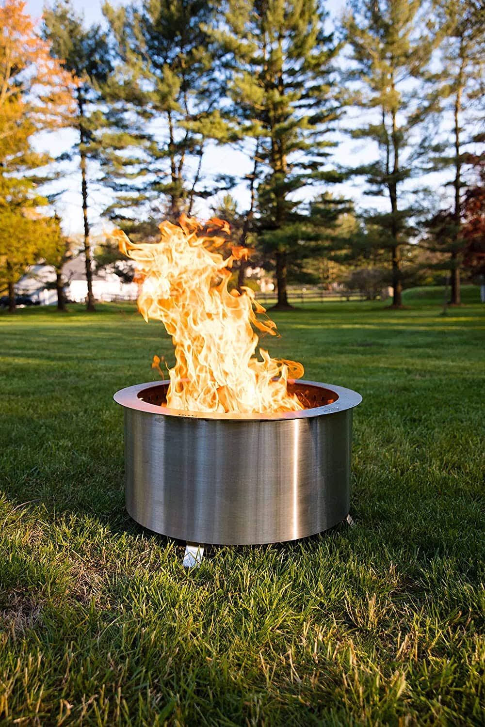 breeo fire pit lit in park outdoors daytime