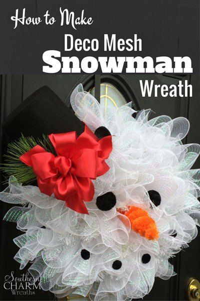 A volumous snowman wreath made from garland and mesh.