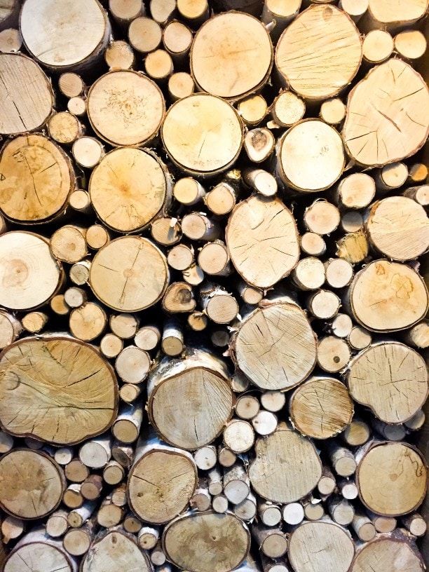 wall of firewood stacked tightly and neatly full cord