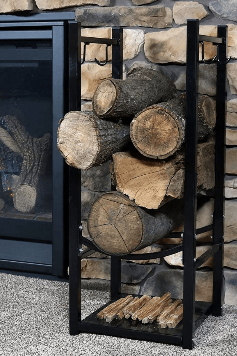 vertical design firewood rack holder beside indoor fireplace