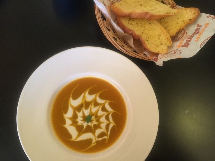 creamy root vegetable soup with garlic bread