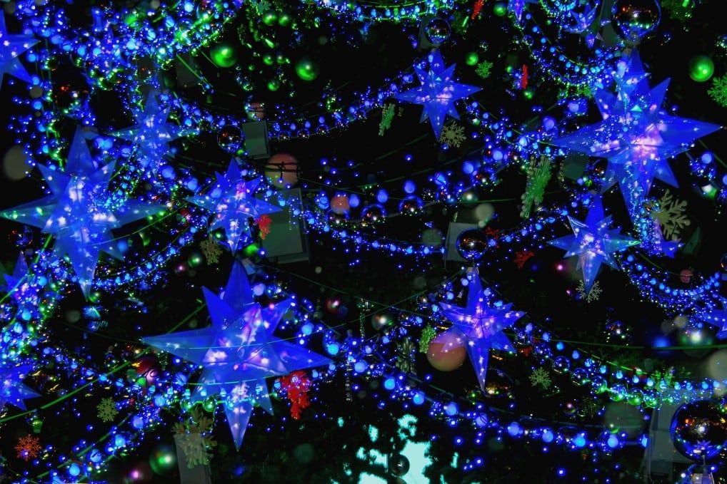 royal blue led lighting on green christmas tree