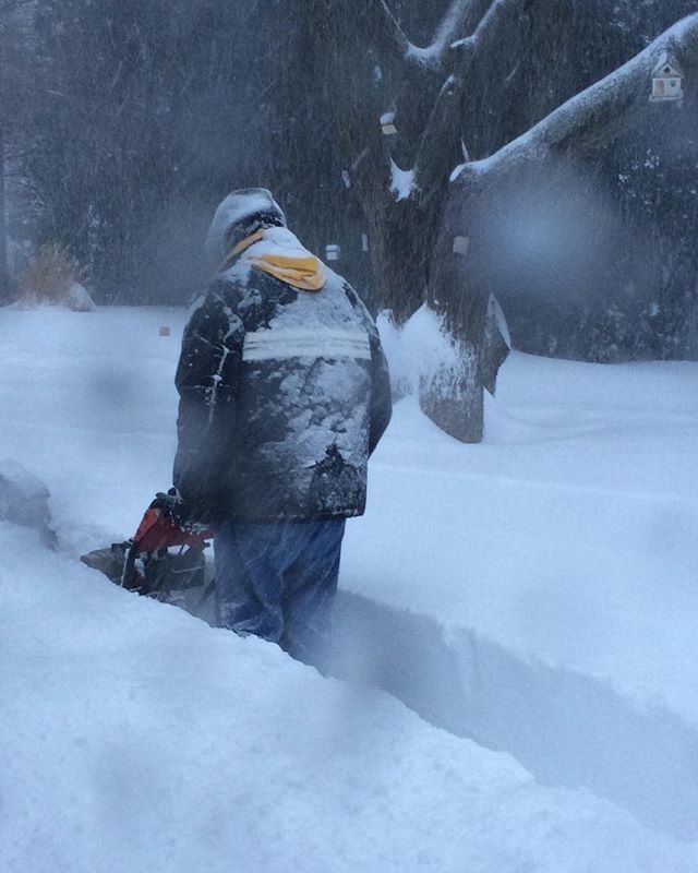 Man using snowblower, snow, nor’easter blizzard, men doing chores, wintertime