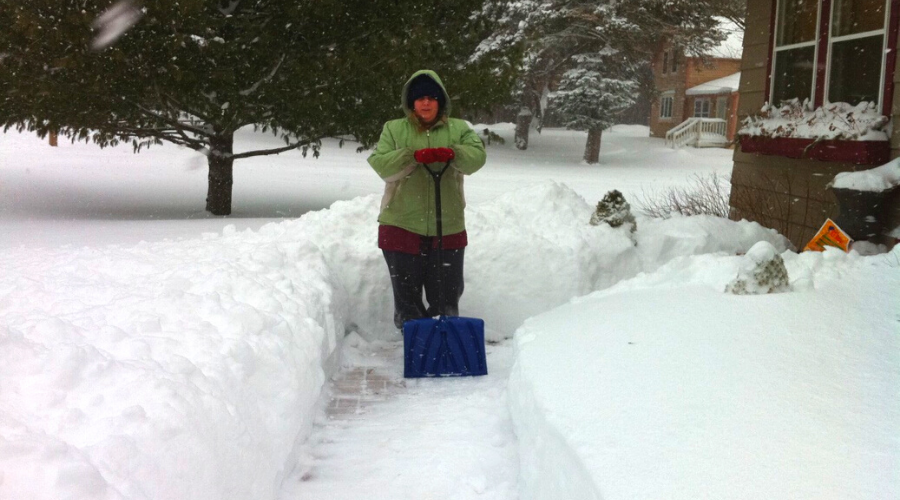 Winter shoveling my favorite chore snow clearing woman outdoors deep path