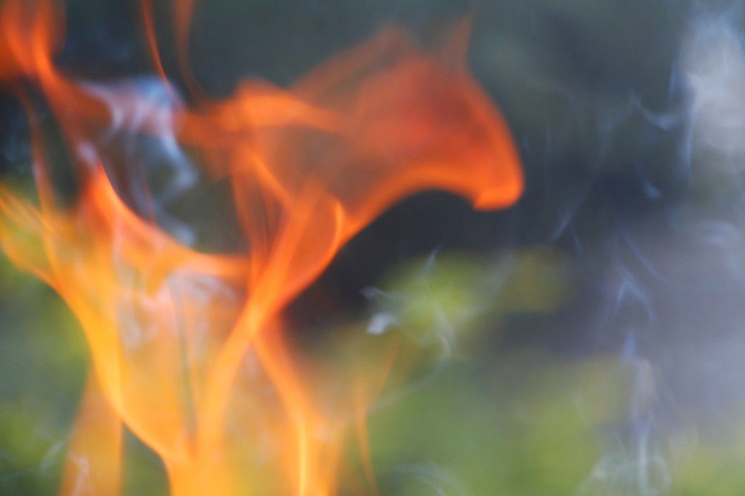 burning woodsmoke outdoors closeup of bonfire
