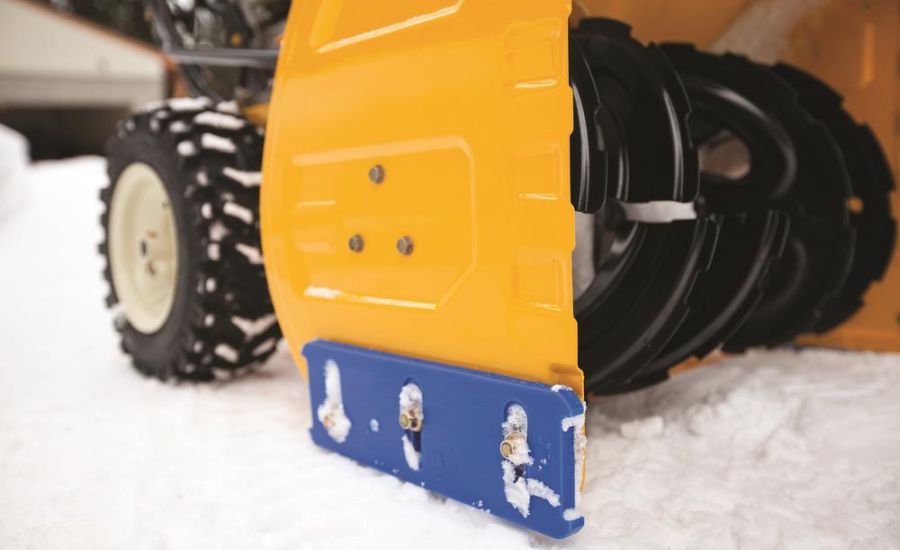 Commercial grade Cub Cadet snow blower with skid plate.