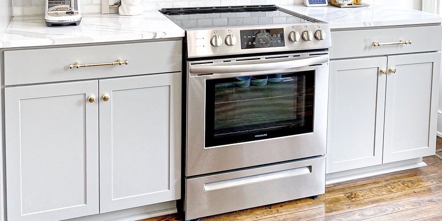 white oven on white kitchen background