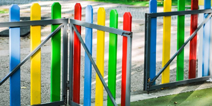 multicolored posts gate