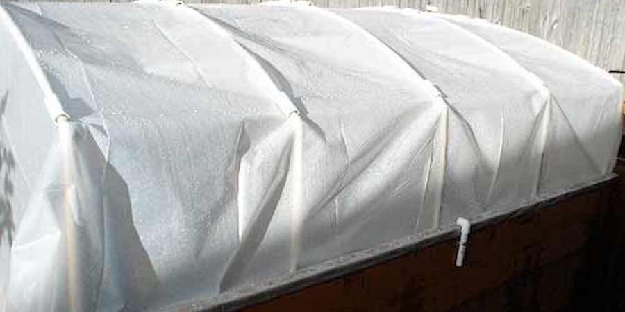 Cold Frame Covered In White Fabric 