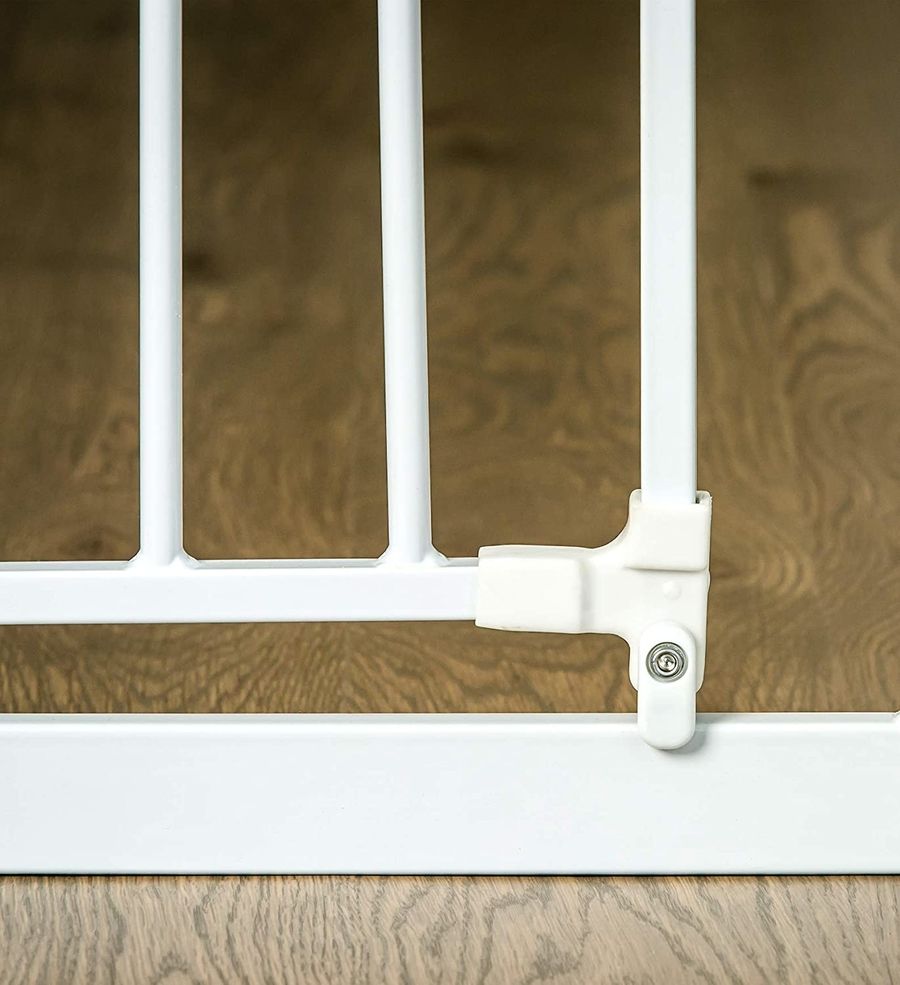 White horizontal and vertical bars on a baby gate.