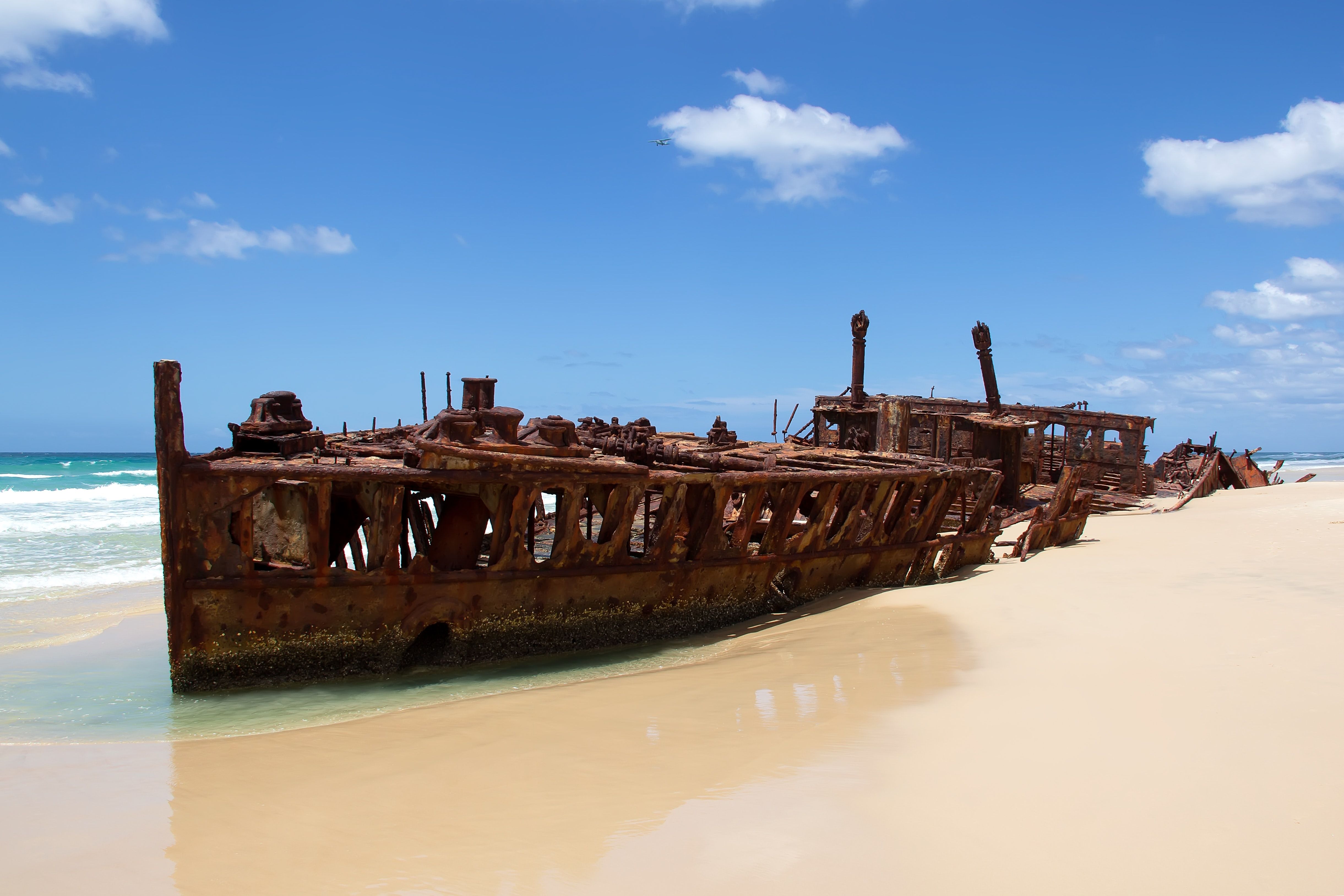 Old rusted ship at the beach