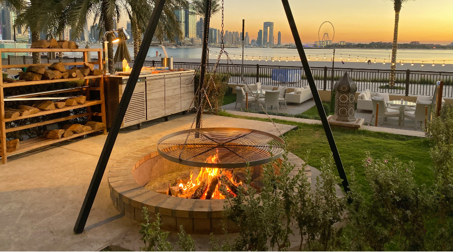 firepit with skyline in background