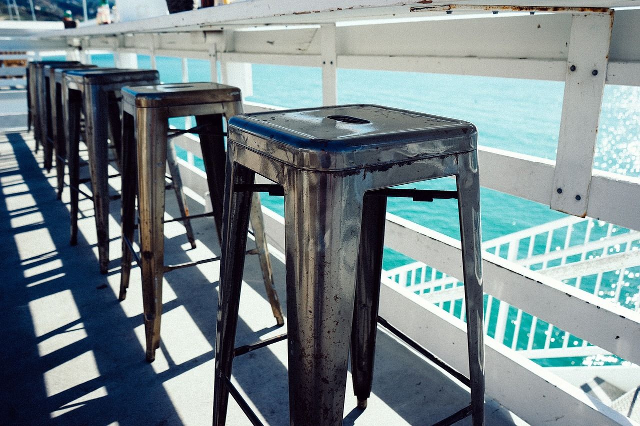 Metal stools with an ocean view
