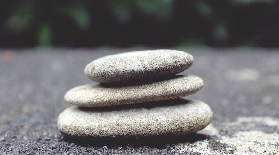 stones stacked in a zen garden