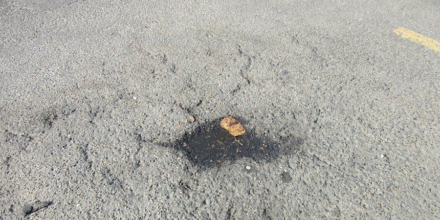 Oil stain on asphalt 