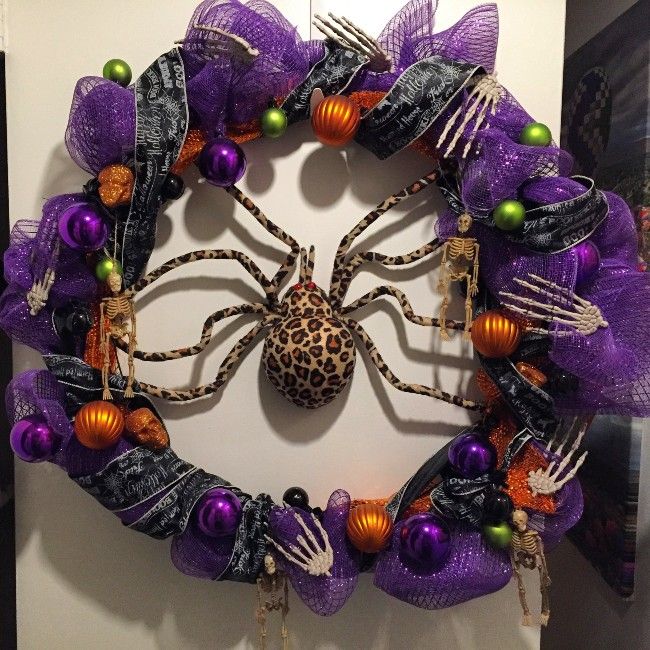 Purple burlap ribbon wreath with large spider in center