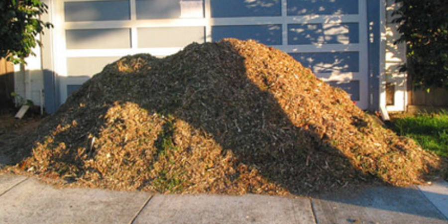 Mulch Pile in Driveway
