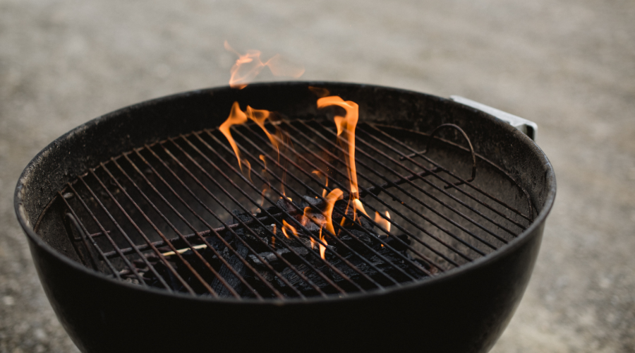 Lit charcoal grill