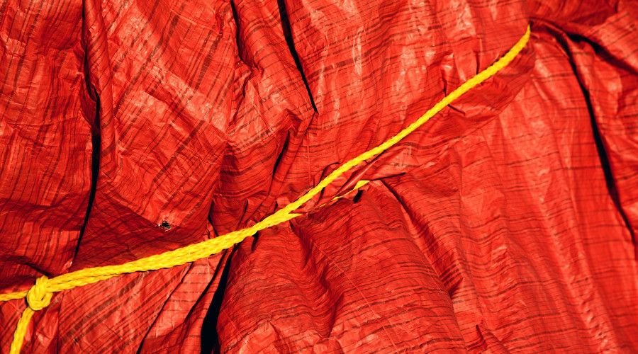 Close-up of red tarp texture