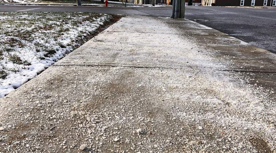 Rock salt on sidewalk