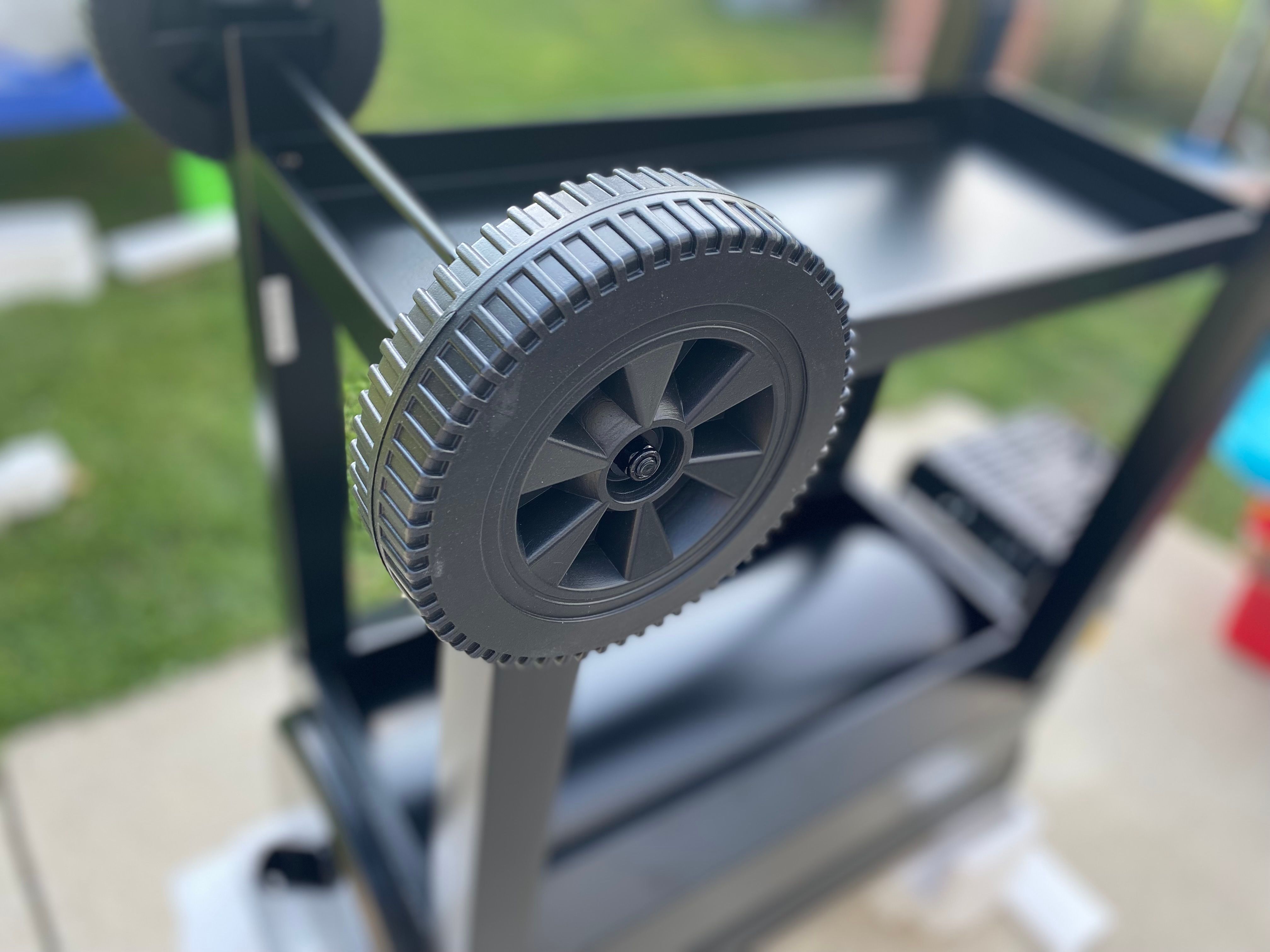 Putting legs and wheels on pellet grill