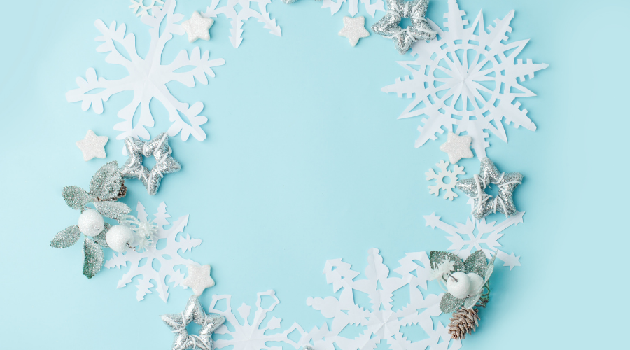 Paper Craft Snowflakes Wreath on Blue Background