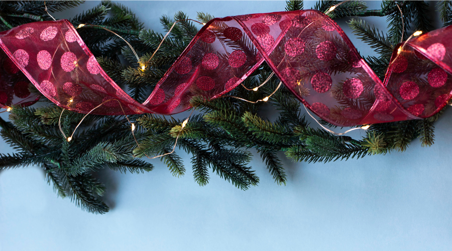 pine garland with red ribbon