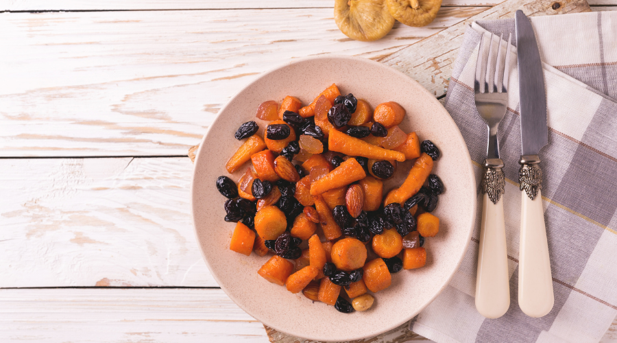 Jewish Tzimmes dessert with carrot, raisins and dried fruits