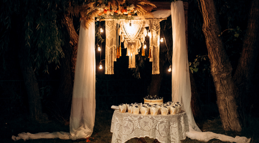 Boho Arch and Dessert Table on Outdoor Wedding