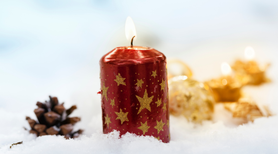 christmas candles outdoors in snow