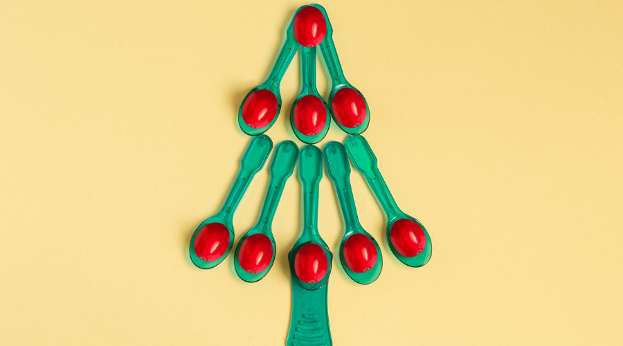 Christmas tree from small plastic spoons with red berries
