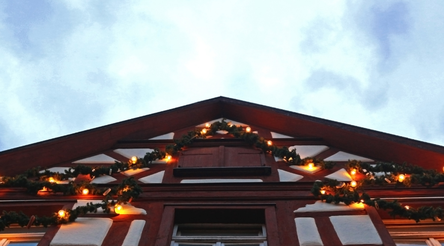 traditional half-timbered house with christmas lights