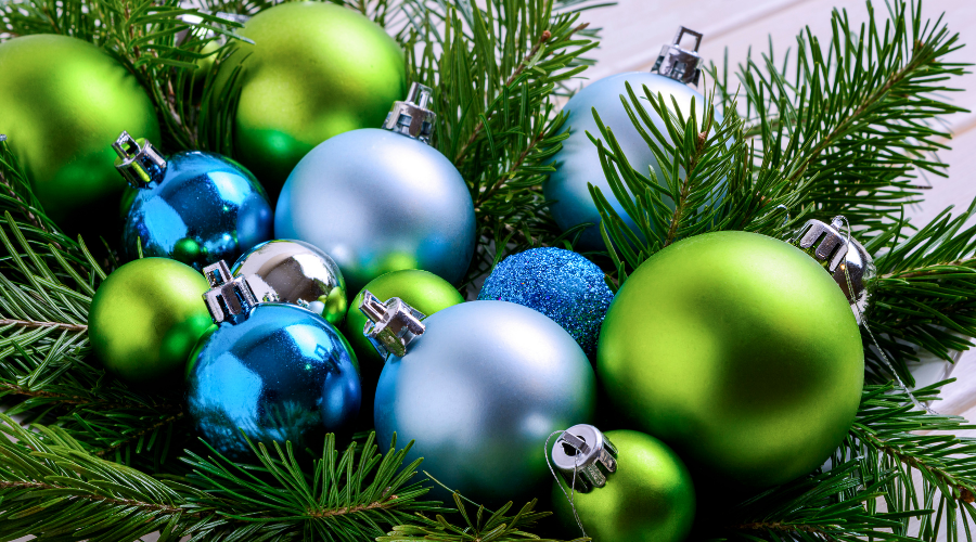 Christmas background with blue and green balls