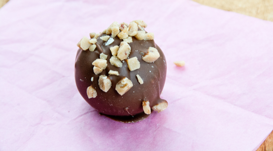 Milk chocolate truffle with walnuts