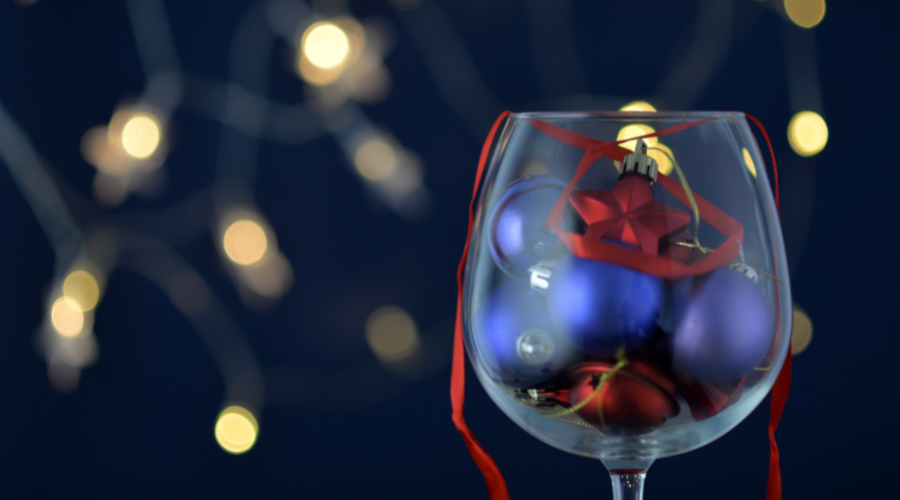Glass wine glass with Christmas toys